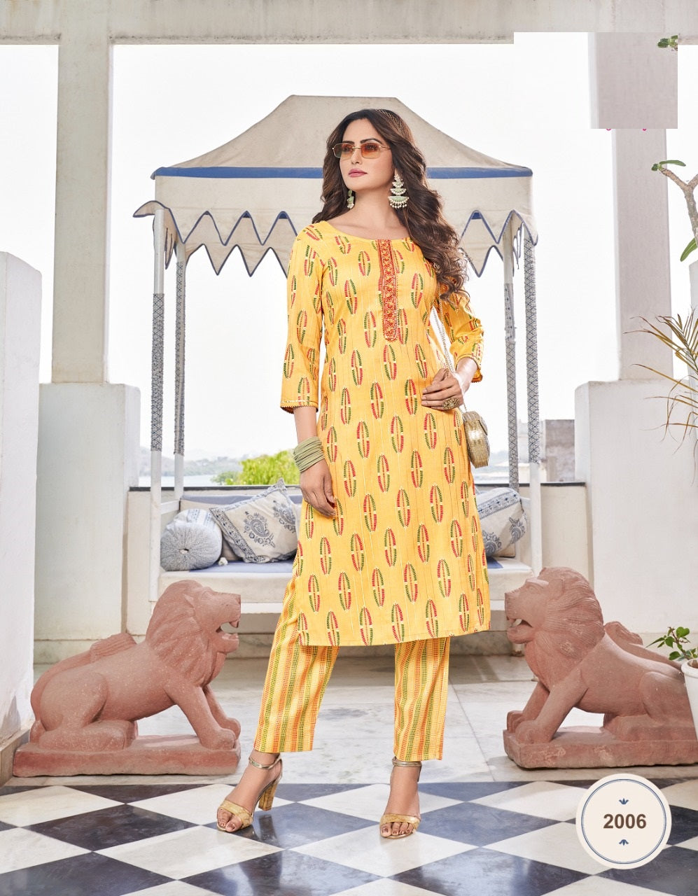Yellow Beautfully Embroidery work and Printed Traditional wear Rayon Kurti With Lining Printed Pant For Womens
